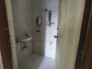 Bathroom in 1 BHK Apartment at Raunak Unnathi Greens, Kasarvadavali – for Rent
