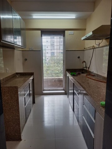 Kitchen in 2 BHK Apartment at Group Seven Rushi Heights, Goregaon East – for Rent