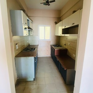 Kitchen in 2.5 BHK Apartment at Mahagun Moderne, Sector 78 – for Rent