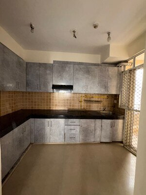 Kitchen in 3 BHK Apartment at Mahagun Mywoods, Sector 16c Greater Noida – for Rent