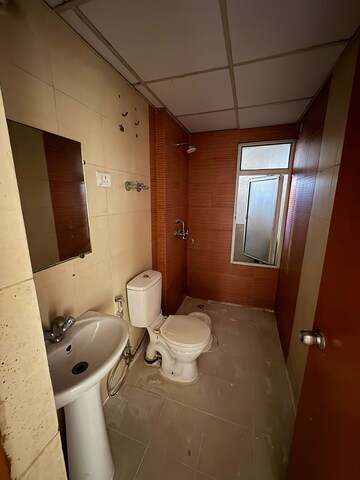 Bathroom in 3 BHK Apartment at Mahagun Mywoods, Sector 16c Greater Noida – for Rent