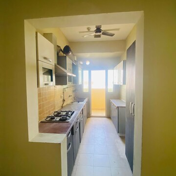 Kitchen in 3 BHK Apartment at Mahagun Moderne, Sector 78 – for Rent