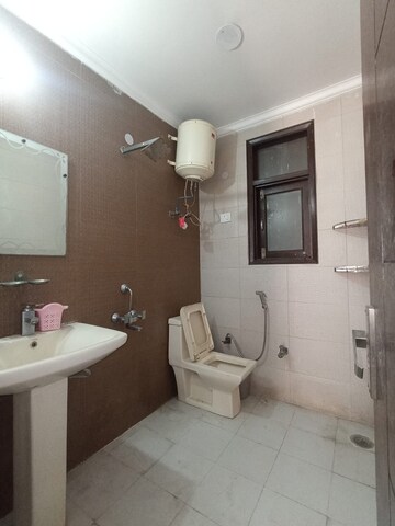 Bathroom in 3 BHK Builder Floor at Freedom Fighters Enclave – for Rent