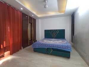 Bedroom in 3 BHK Builder Floor at Freedom Fighters Enclave – for Rent