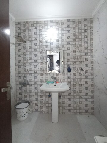 Bathroom in 3 BHK Builder Floor at Freedom Fighters Enclave – for Rent