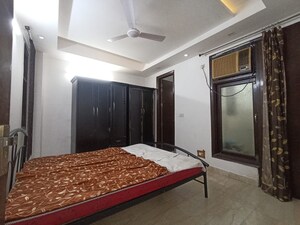 Bedroom in 3 BHK Builder Floor at Freedom Fighters Enclave – for Rent