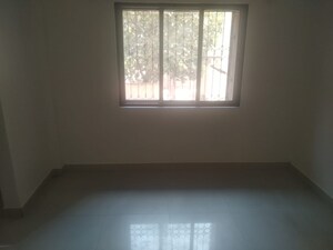 Room in 1 BHK Apartment at New Mhada Tower, Malad West – for Rent