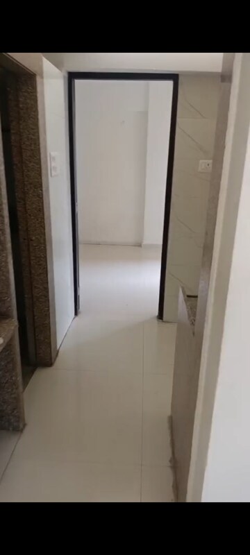 Building Lobby in 1 BHK Apartment at Prithvi Pride, Mira Road – for Rent