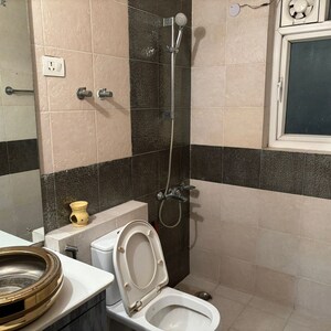 Bathroom in 2 BHK Apartment at Niho Marvel Scottish Garden, Ahinsa Khand 2 – for Rent