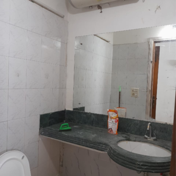 Bathroom in 3 BHK Apartment at Pragya Kunj  Apartments, Kailash Colony – for Rent