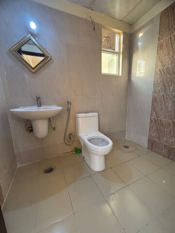 Bathroom in 3 BHK Apartment at Aditya City Apartments, Shahpur Bamheta – for Sale