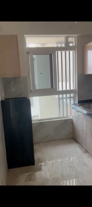 Kitchen in 2 BHK Apartment at Wadhwa TW Gardens, Kandivali East – for Rent