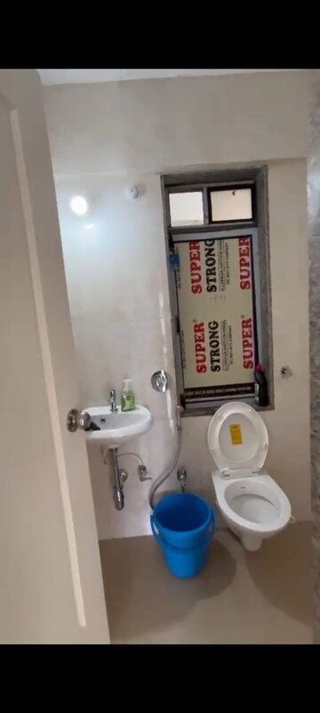 Bathroom in 2 BHK Apartment at Dynamix Avanya, Dahisar East – for Rent