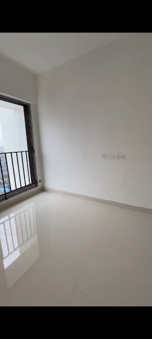 Master Bedroom in 2 BHK Apartment at Dynamix Avanya, Dahisar East – for Rent