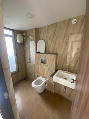 Bathroom in 2 BHK Apartment at Lodha Amara, Kolshet Road – for Rent