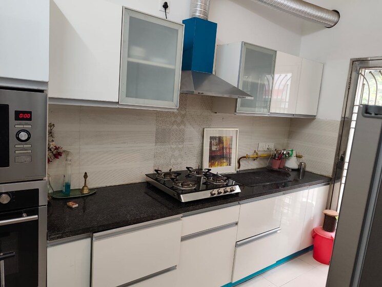 Kitchen, paramount-golf-foreste-apartments 4 Bedroom 3250 Sq.Ft. Villa In Zeta I Greater Noida Greater Noida 9241113