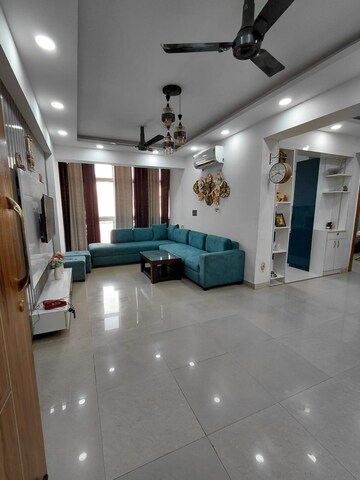 Living Room in 4 BHK Apartment at Amrapali Royal, Vaibhav Khand – for Sale