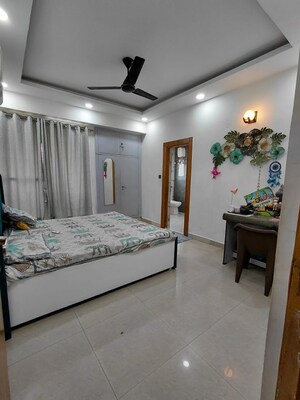 Bedroom in 4 BHK Apartment at Amrapali Royal, Vaibhav Khand – for Sale