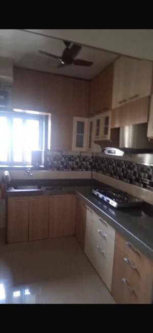 Kitchen in 2.5 BHK Apartment at Runwal Garden City, Balkum Pada – for Rent