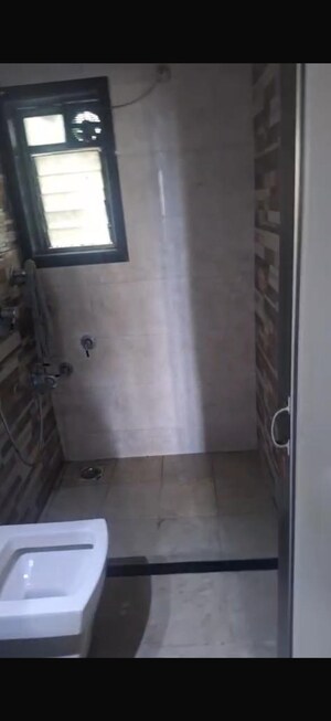 Bathroom in 2.5 BHK Apartment at Runwal Garden City, Balkum Pada – for Rent