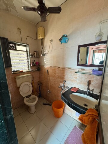 Bathroom in 2 BHK Apartment at Vardhman Gardens, Balkum Pada – for Sale