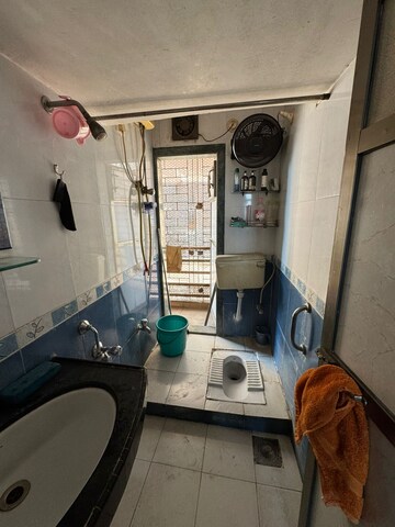 Bathroom in 2 BHK Apartment at Vardhman Gardens, Balkum Pada – for Sale