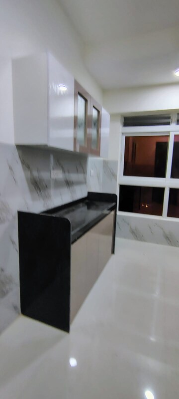 Kitchen in 2 BHK Apartment at Wadhwa TW Gardens, Kandivali East – for Rent