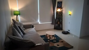 Living Room in 1 BHK Apartment at Kalpataru Immensa, Kolshet Road – for Rent