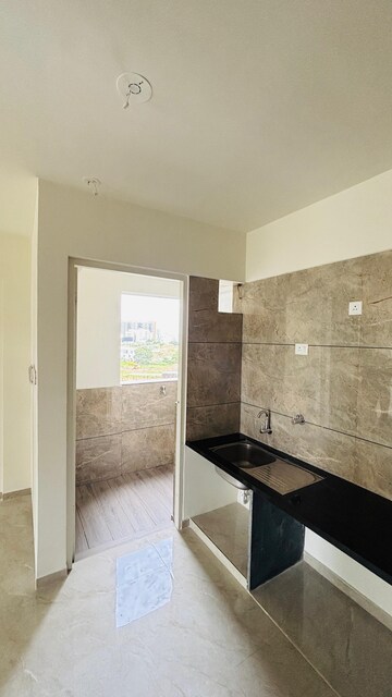 Kitchen in 2.5 BHK Apartment at Rama Celestial City, Ravet – for Rent