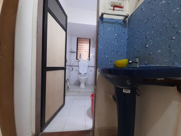Kitchen in 2 BHK Apartment at Nav Joytiling CHS, Goregaon East – for Rent
