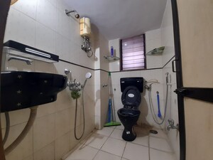 Attached Bathroom in 2 BHK Apartment at Nav Joytiling CHS, Goregaon East – for Rent