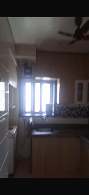 Kitchen in 2 BHK Apartment at Runwal Garden City, Balkum Pada – for Rent