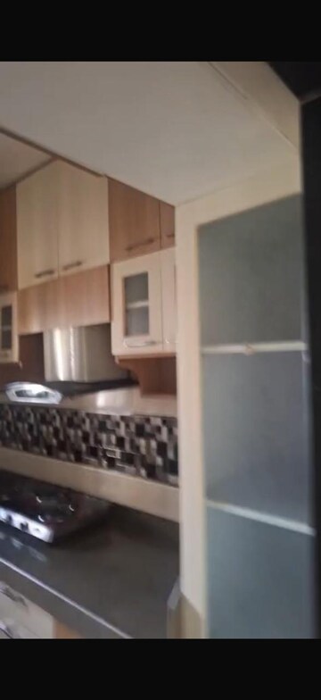 Kitchen in 2 BHK Apartment at Runwal Garden City, Balkum Pada – for Rent