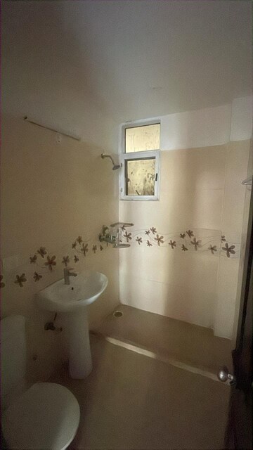 Bathroom in 2 BHK Apartment at Niho Saffron Scottish Garden, Ahinsa Khand 2 – for Sale