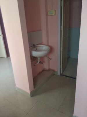 Bathroom in 1 BHK Apartment at New Mhada Tower, Malad West – for Sale