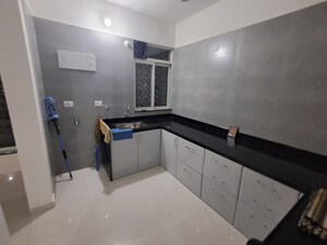Kitchen in 2 BHK Apartment at Rama Fusion Towers, Hinjewadi – for Rent