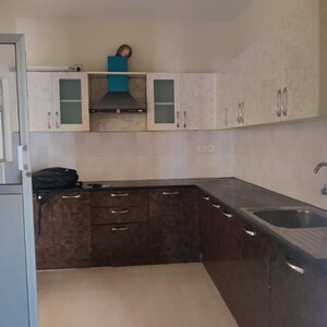 Kitchen in 2 BHK Apartment at Suncity Gloria Apartments, Carmelaram Road – for Rent