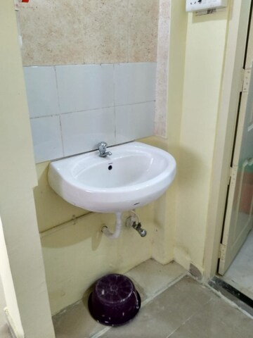 Bathroom in 1 BHK Apartment at New Mhada Tower, Malad West – for Rent