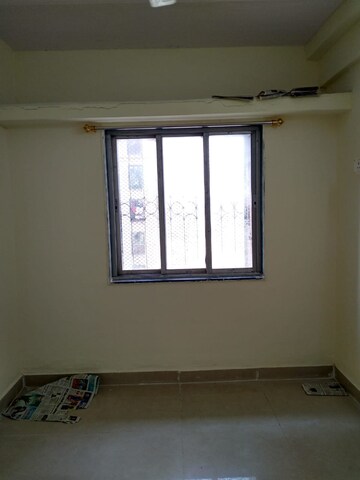 Room in 1 BHK Apartment at New Mhada Tower, Malad West – for Rent