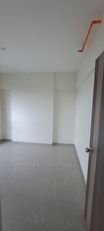 Room in 2 BHK Apartment at Veena Smart Homes, Kandivali West – for Sale