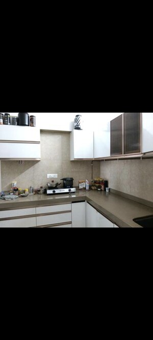 Kitchen in 2 BHK Apartment at Dosti West County, Balkum Pada – for Rent
