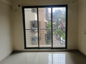 Room in 2 BHK Apartment at Rashi Tower, Goregaon East – for Sale