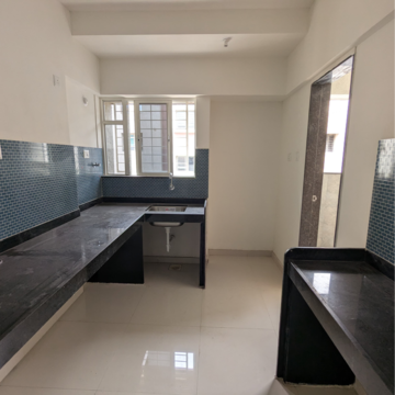 Kitchen in 2 BHK Apartment at Divine Palm Springs, Bhagwan Nagar – for Sale