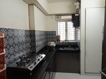 Kitchen in 2 BHK Apartment at Lodha Amara, Kolshet Road – for Rent