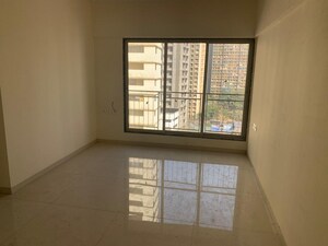 Room in 1 BHK Apartment at Dharti Presidio, Malad West – for Rent