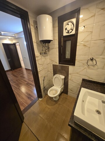 Bathroom in 3 BHK Builder Floor at Risland Sky Mansion, Chattarpur – for Rent