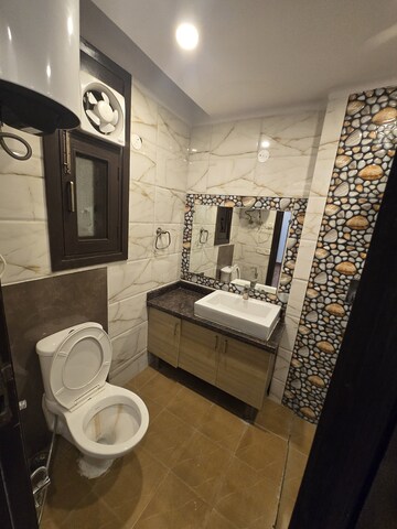 Bathroom in 3 BHK Builder Floor at Risland Sky Mansion, Chattarpur – for Rent