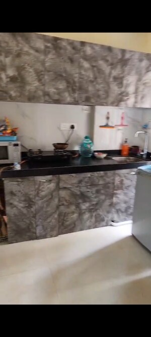 Kitchen in 1 BHK Apartment at Ruparel Elara, Kandivali West – for Rent