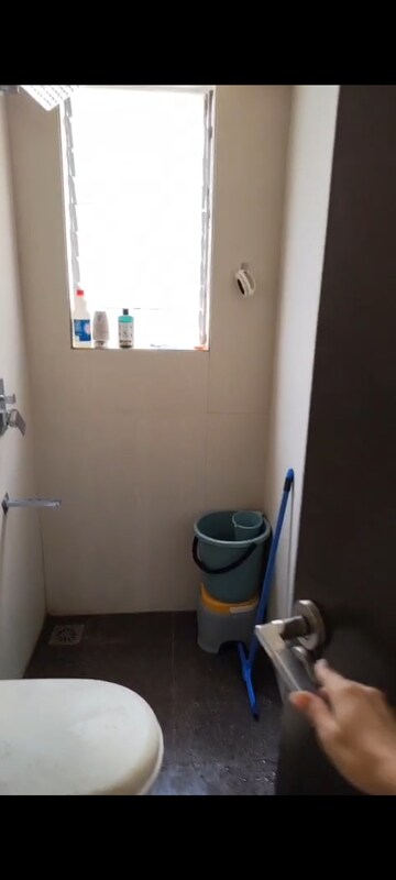 Bathroom in 1 BHK Apartment at Ruparel Elara, Kandivali West – for Rent