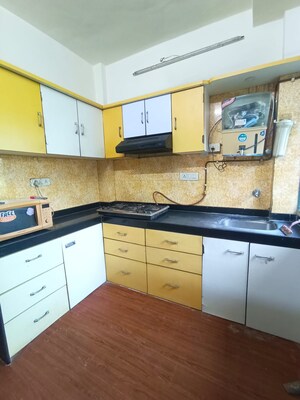 Kitchen in 1 BHK Apartment at Runwal Garden City, Balkum Pada – for Rent
